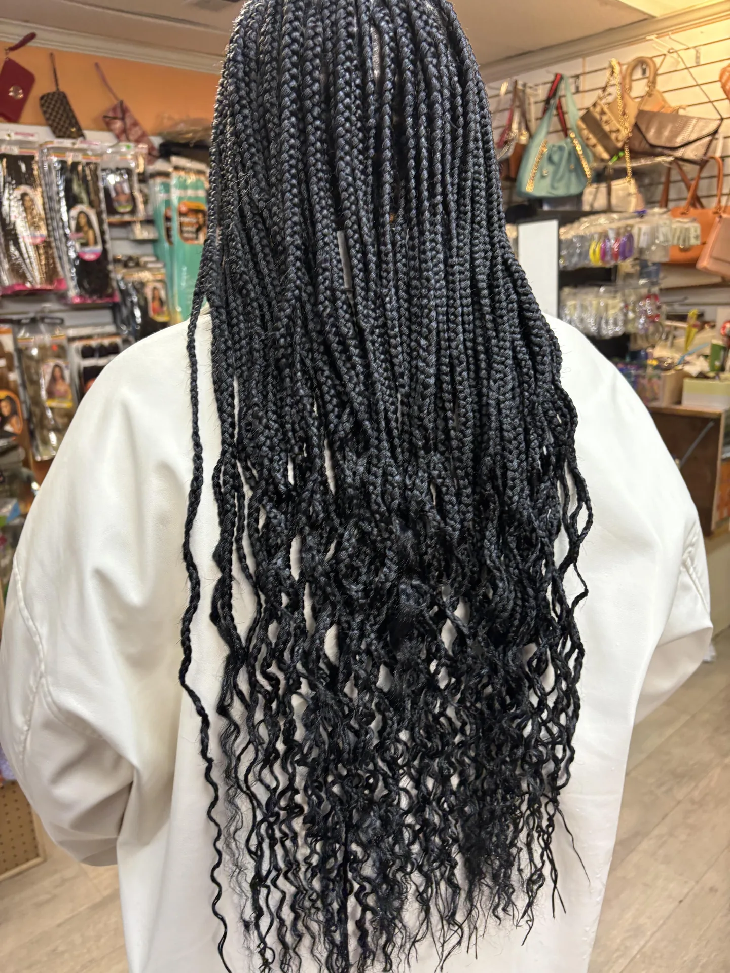 Micro Braids with Curled Ends hairstyle by New Look Hair Salon in Attleboro MA