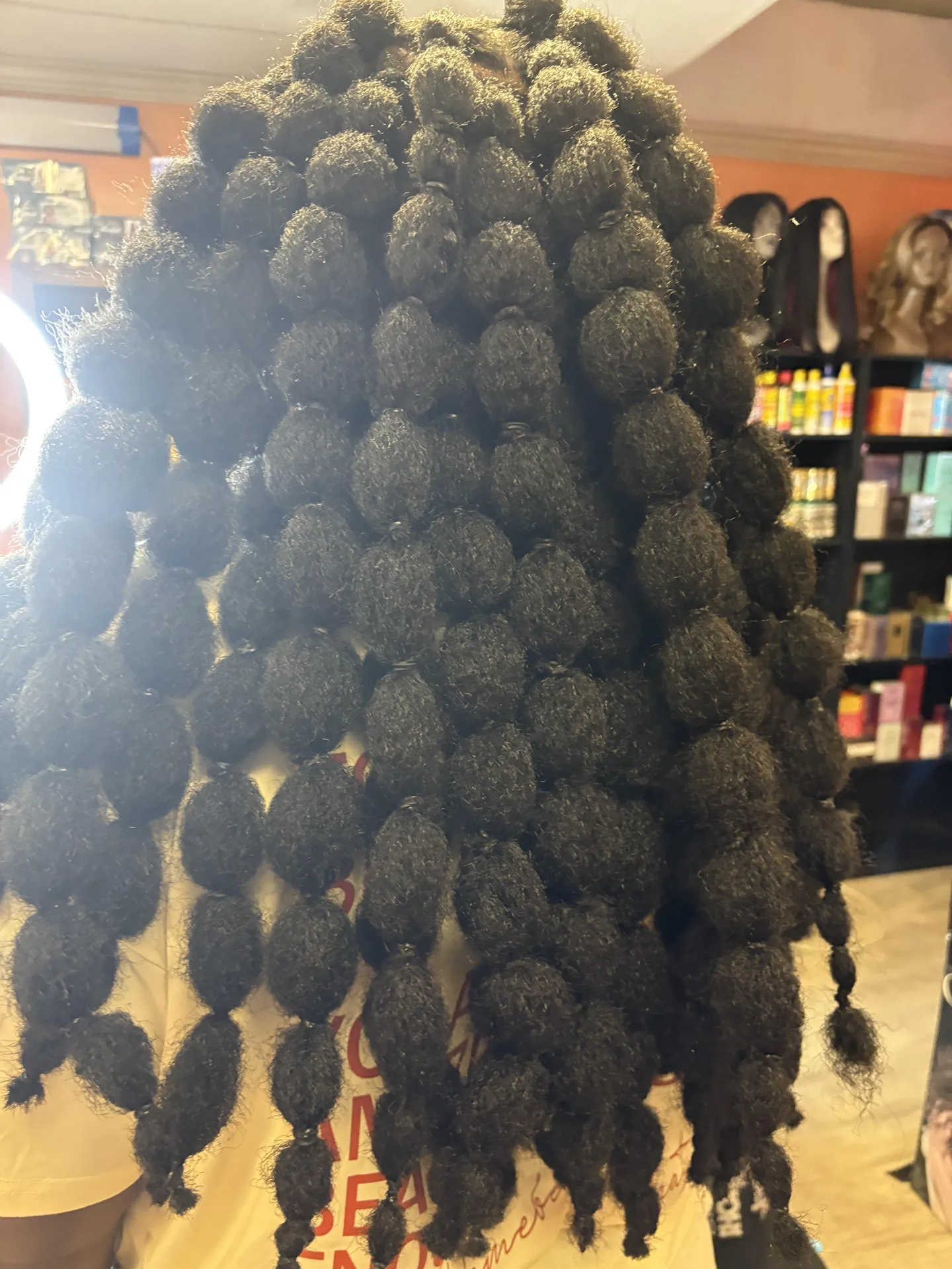 Textured Bubble Ponytail hairstyle by New Look Hair Salon in Attleboro MA