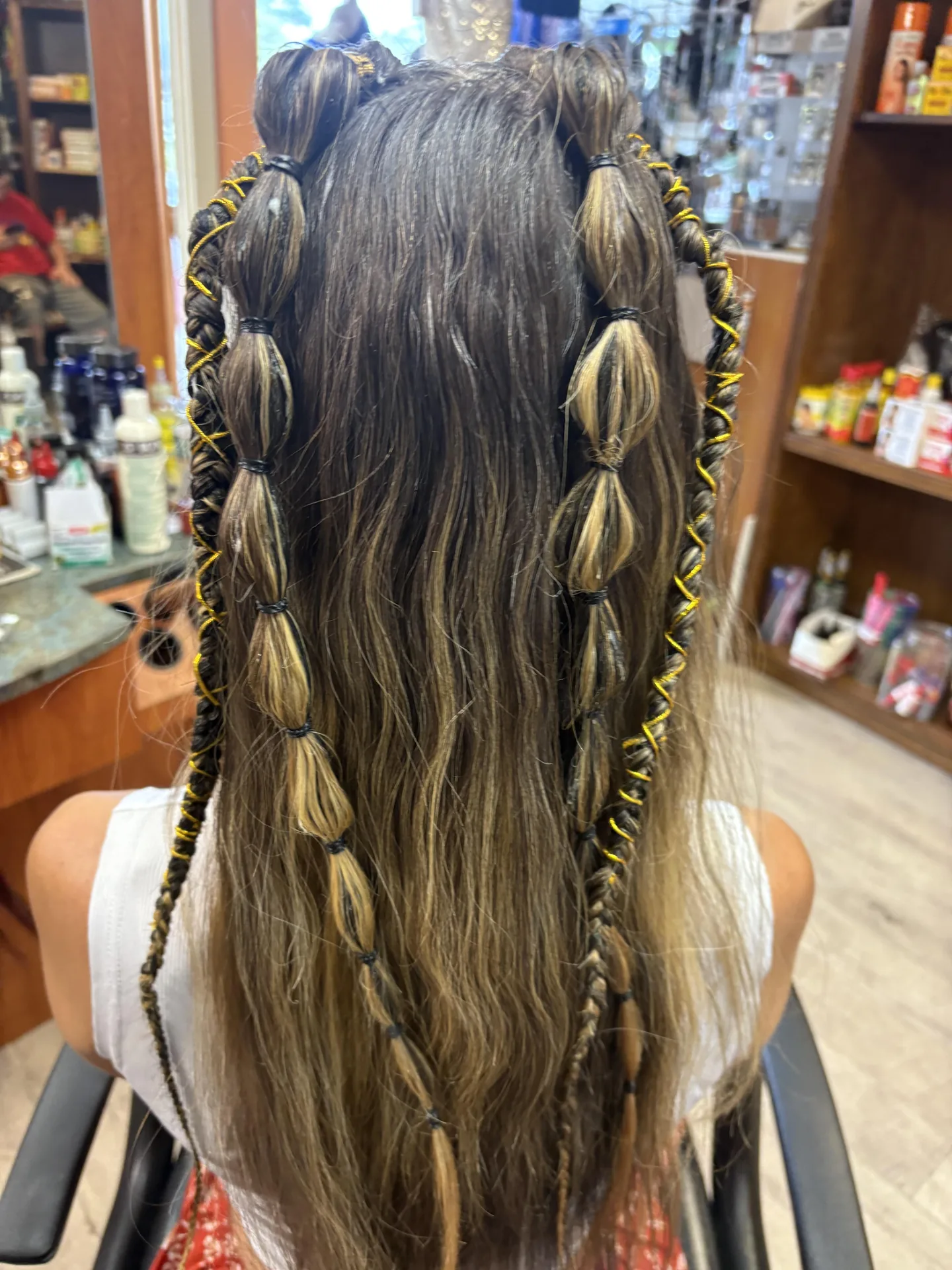 Boho Braids with Soft Waves hairstyle by New Look Hair Salon in Attleboro MA