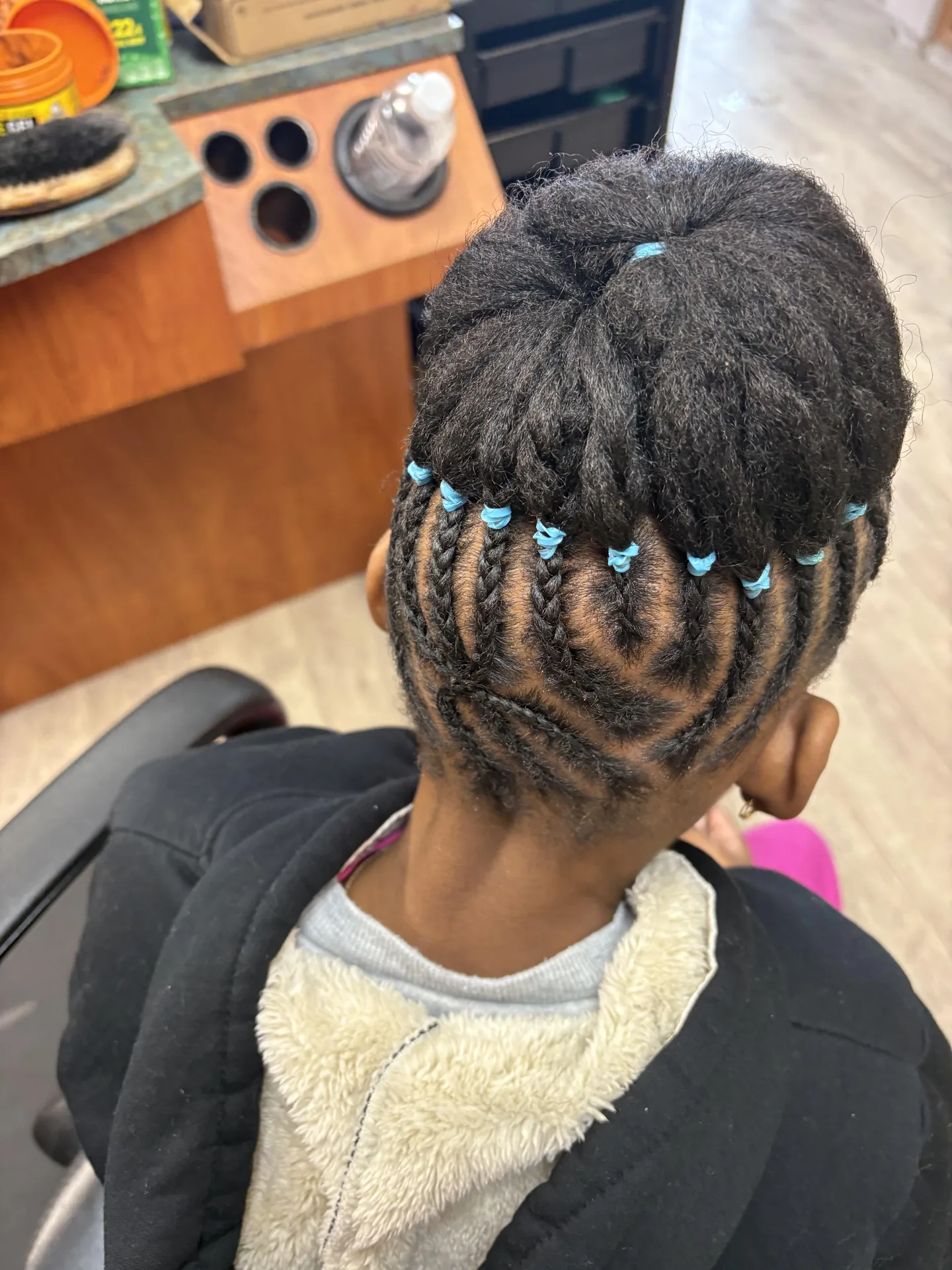 Braided Updo Detail hairstyle by New Look Hair Salon in Attleboro MA