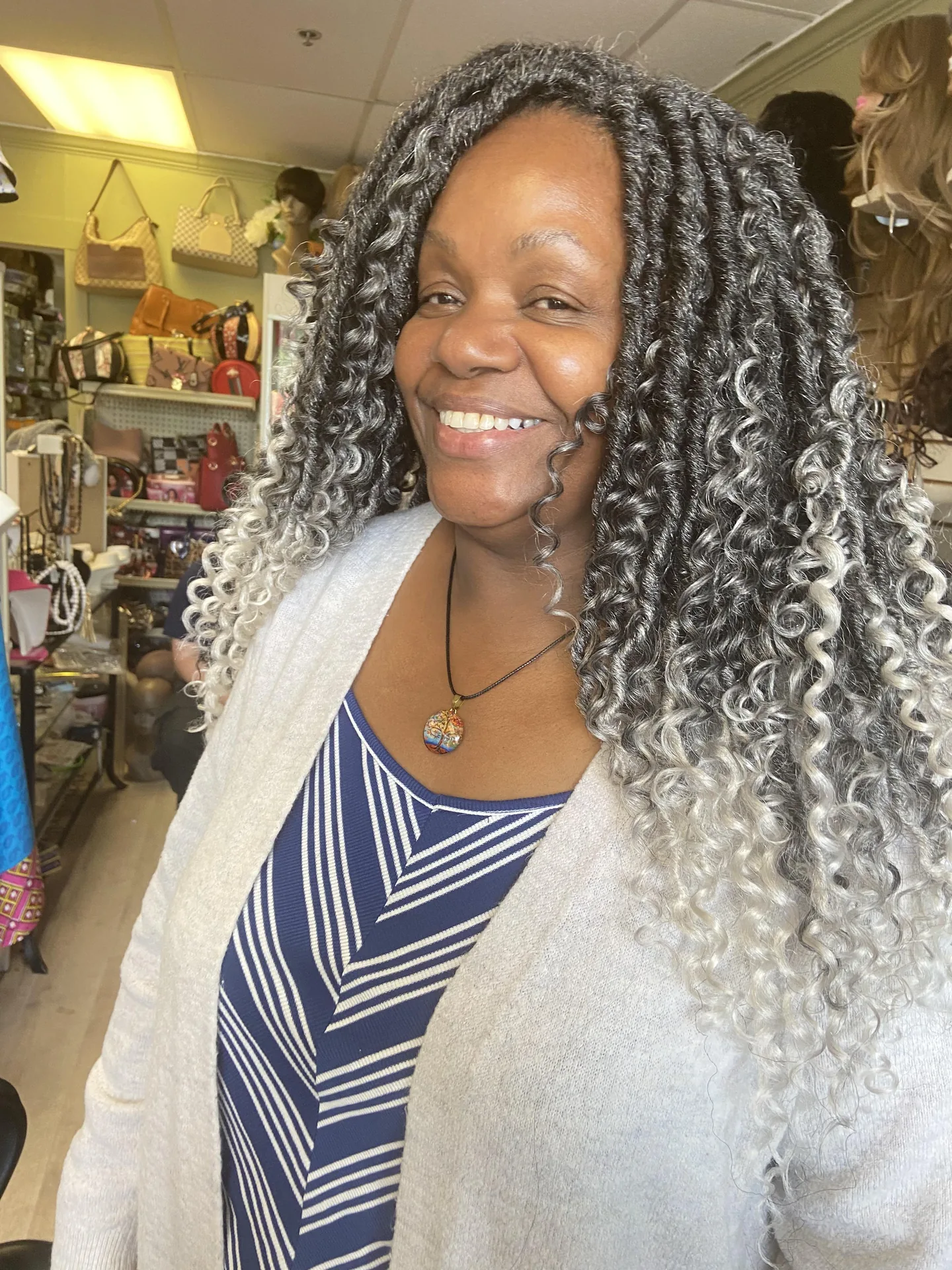 Silver Curl Transformation hairstyle by New Look Hair Salon in Attleboro MA